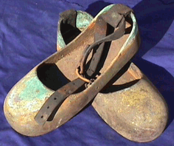 A pair of brass, weighted diver's 'sandals'